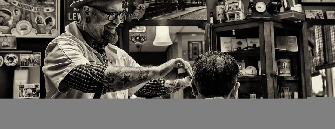 Sfeerbeeld van de barbershopstoel in Zijn Haar