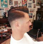 Warme doek wordt aangebracht voor het scheren