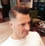 Scheercrème wordt aangebracht met een scheerkwast